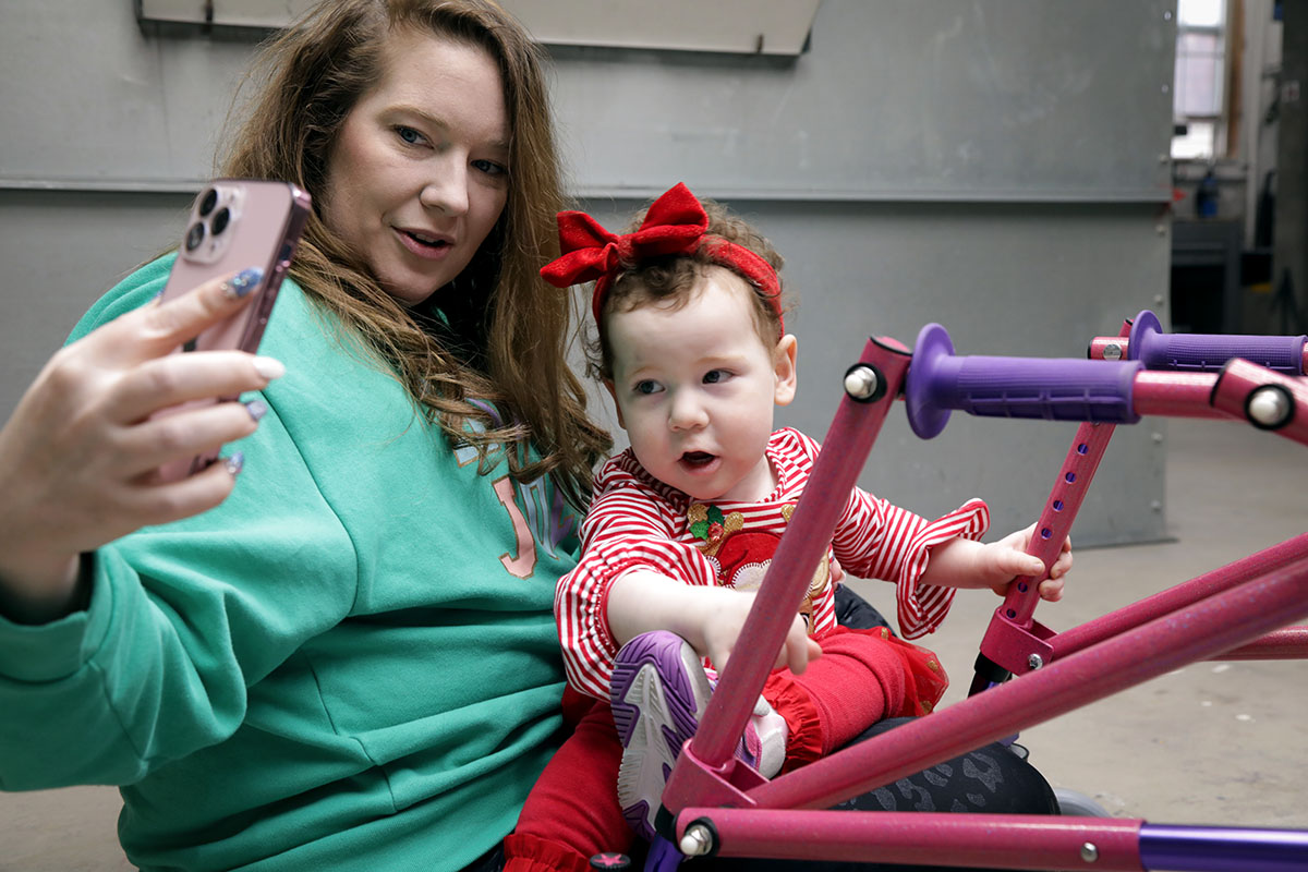 2yearold girl with rare illness gets walker painted sparkly pink