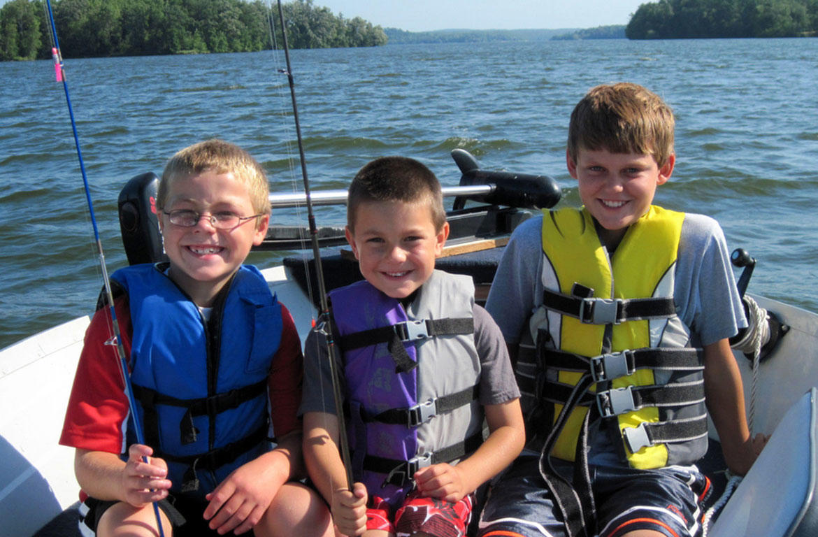 kids on boat
