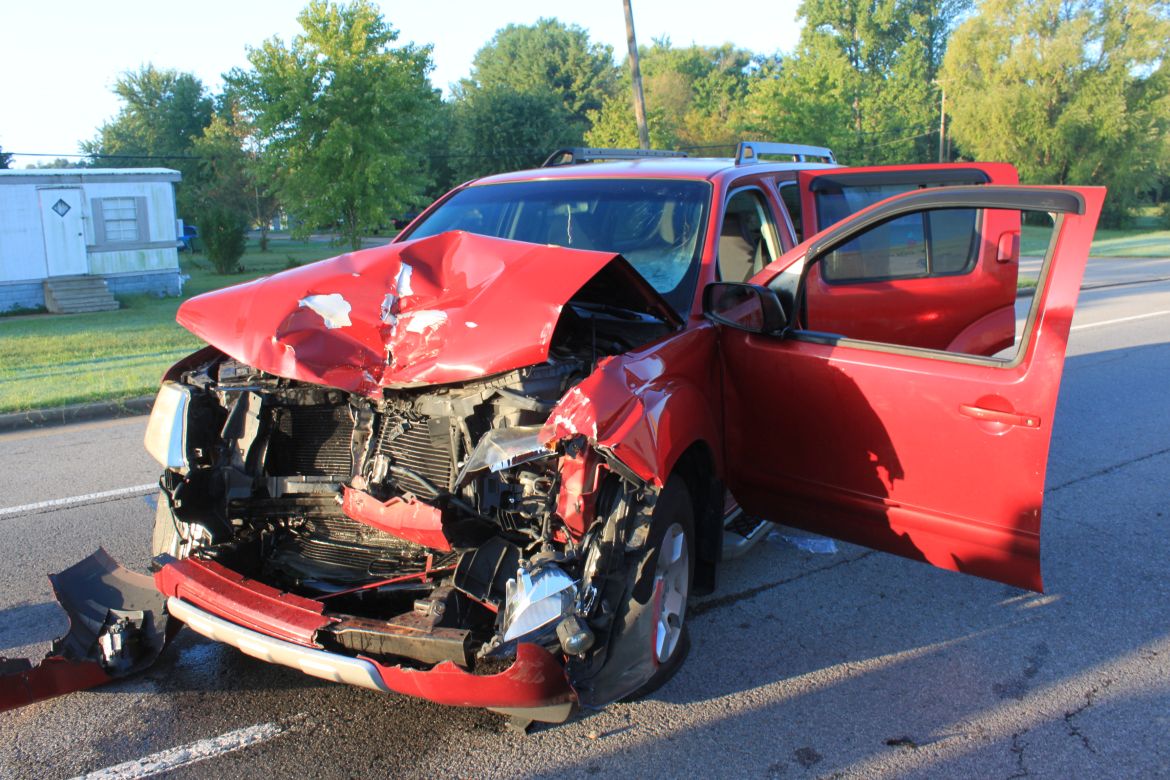 Clarksville police: Woman rear-ends fire truck on Tiny Town Road