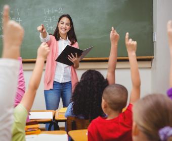 Teacher interacting with students