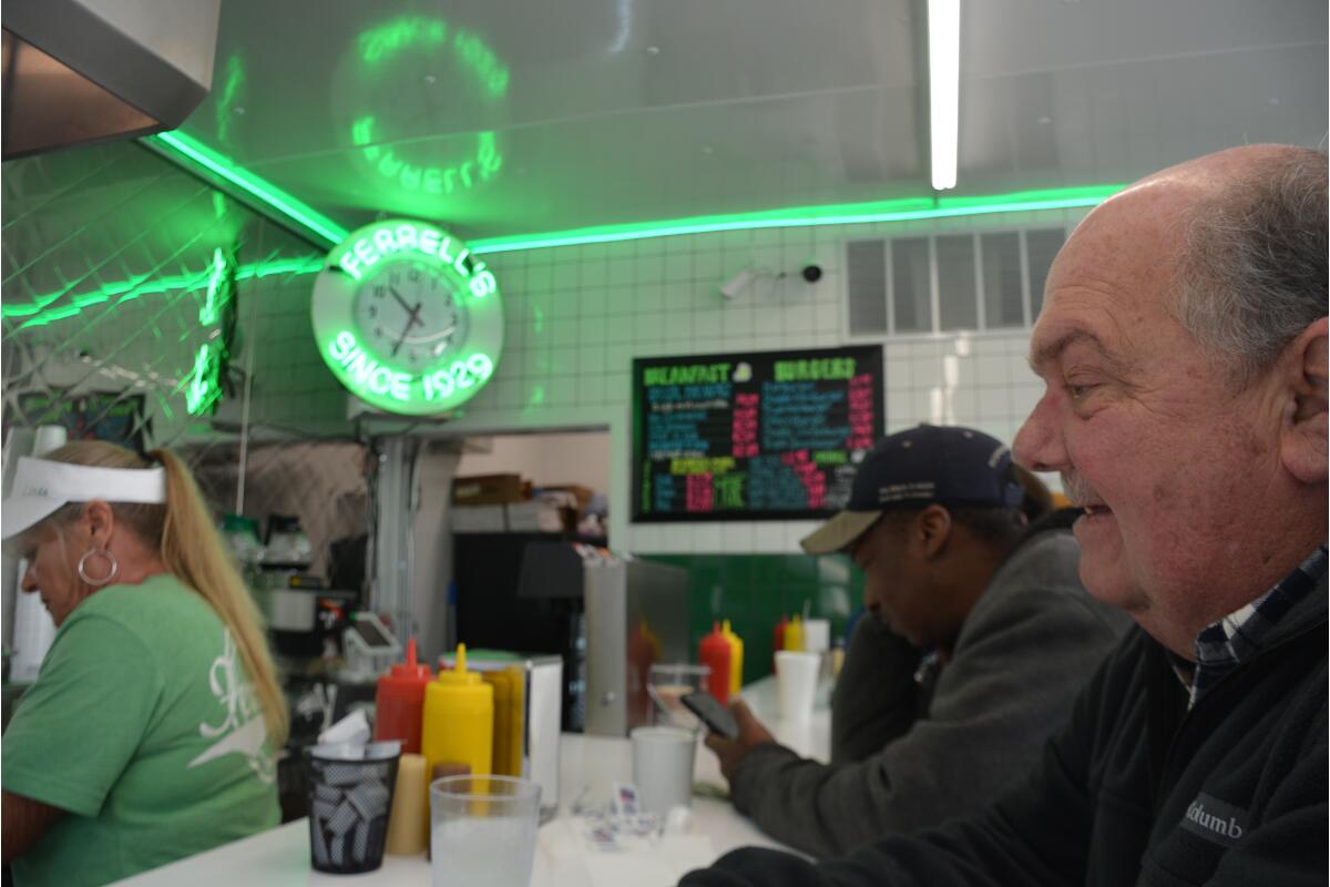 Ferrell’s Hamburgers regulars return to the counter, restaurant reopens after fire