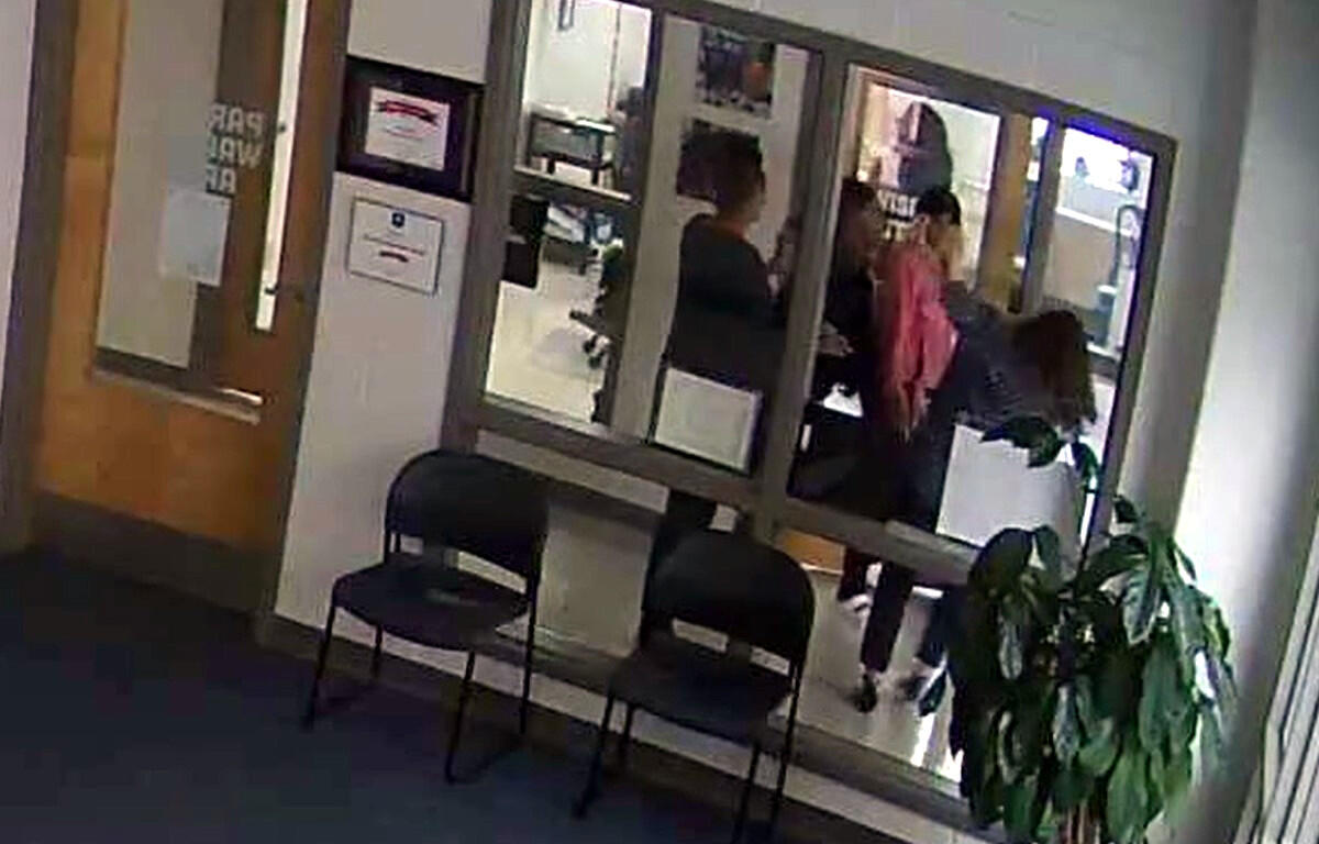 The principal of Glenellen Elementary School in Clarksville, TN, is assaulted by a parent during a meeting on Thursday, April 21, 2022. (CMCSS, contributed via MCSO)
