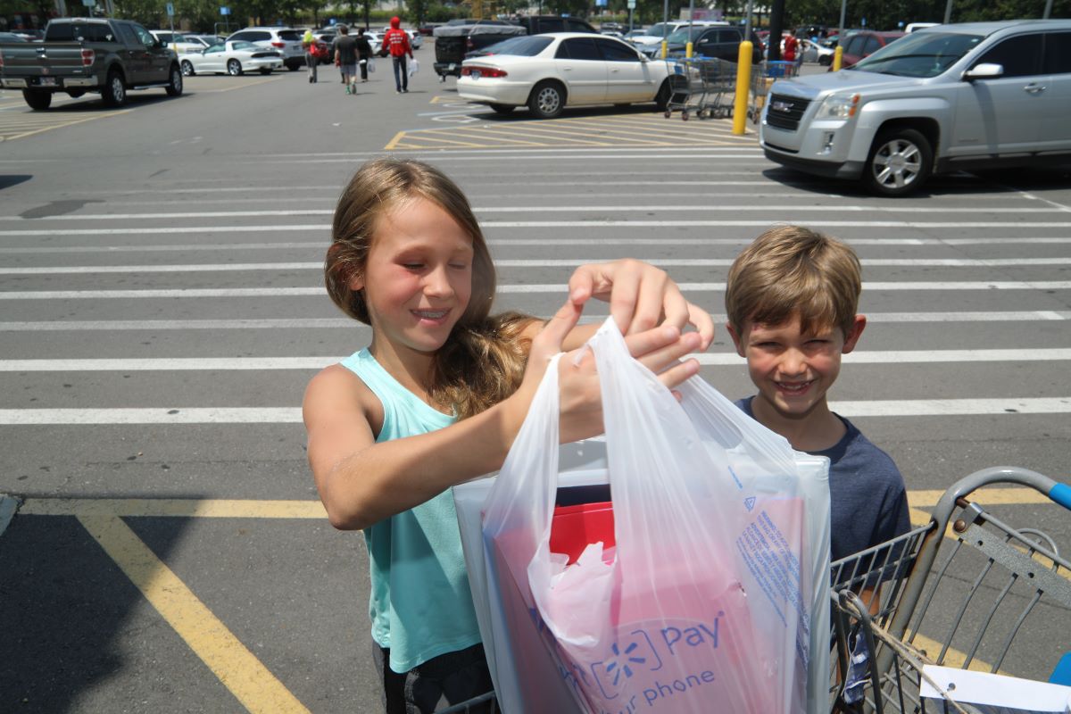 School supplies come rolling in at annual Stuff the Bus event for Teacher Warehouse