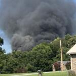 A large fire fills the sky with smoke off Tylertown Road on July 28, 2023. (Neil Fenner, contributed)