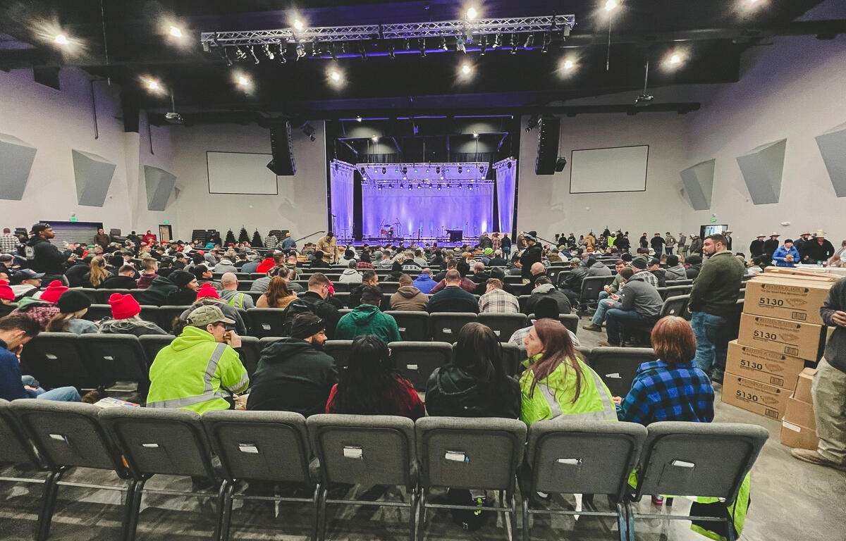 Volunteers gather at Mosaic Church to lend a helping hand in post-tornado cleanup efforts on December 14, 2023. (Wesley Irvin)