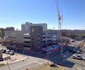 The parking garage under construction at F&M Bank Arena, seen from Shelby's Trio, on Jan. 14, 2025. (Chris Smith)
