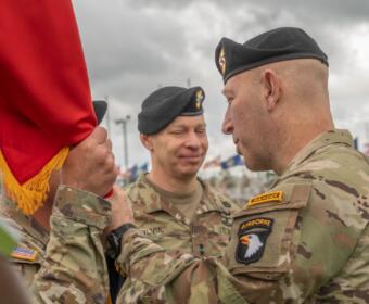 Maj. Gen David Gardner, right, incoming commanding general of the 101st Airborne Division and Fort Campbell, with Maj. Gen. Brett Sylvia, outgoing commanding general, during the change of command ceremony, May 30, 2025. (U.S. Army photo by Staff Sgt. Kaden D. Pitt)