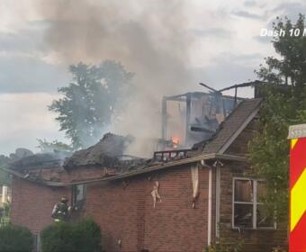 A house caught fire on Porter Hills Court on May 19, 2025. (Dash 10 Media)