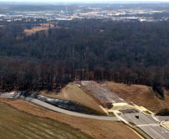 The current terminus of Spring Creek Parkway, looking past Spring Creek toward Wilma Rudolph Boulevard, as of May 2025. (Contributed by City of Clarksville)