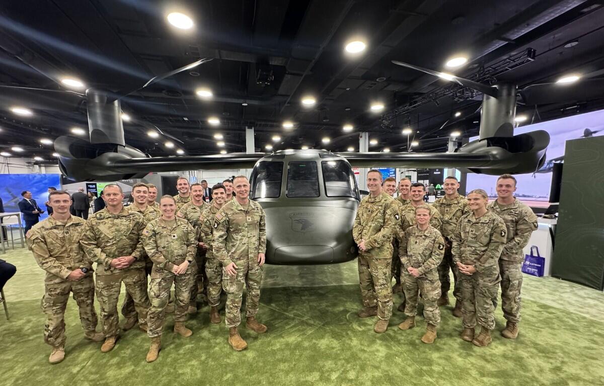 Soldiers with the 101st Airborne Division standing with the new MV-75 FLRAA tiltrotor aircraft at the annual Army Aviation Association of America conference in Nashville on May 14, 2025. (US Army PAO, contributed)