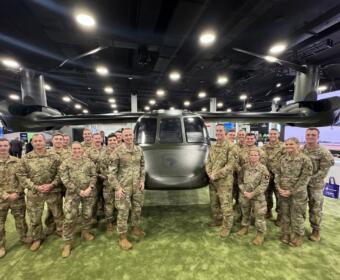Soldiers with the 101st Airborne Division standing with the new MV-75 FLRAA tiltrotor aircraft at the annual Army Aviation Association of America conference in Nashville on May 14, 2025. (US Army PAO, contributed)