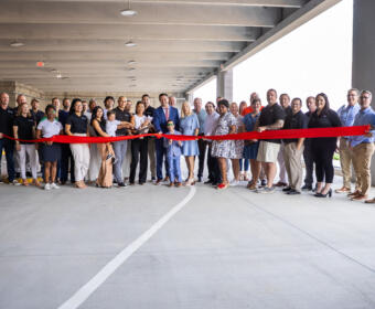 Millan Public Parking Garage ribbon cutting on June 27, 2025. (Wesley Irvin)