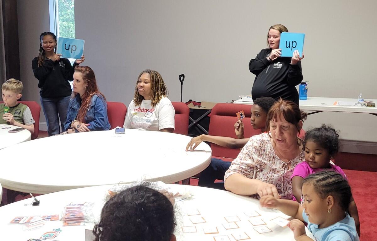 APSU Master of Public Health students lead a family reading training session at a local Head Start center. Their evidence-based programming features engaging activities like word recognition bingo. (APSU, Contributed)