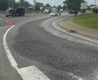 A truck spilled gravel onto Providence Boulevard on June 12, 2025. (CPD, contributed)