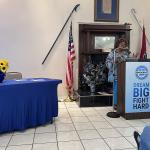 Hon. Carol Berry, member of the CMCSS school board, speaking at the Blue South BBQ on July 19.