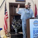 Charles Uffelman, former chair of the MCDP, speaking at the Blue South BBQ on July 19.