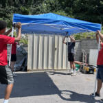 Volunteers at the Hands On and Loaves and Fishes Mural Painting on July 24