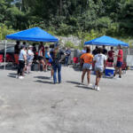Volunteers at the Hands On and Loaves and Fishes Mural Painting on July 24