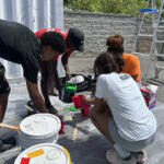 Volunteers at the Hands On and Loaves and Fishes Mural Painting on July 24
