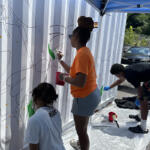 Volunteers at the Hands On and Loaves and Fishes Mural Painting on July 24