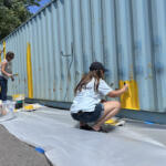 Volunteers at the Hands On and Loaves and Fishes Mural Painting on July 24