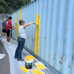 Volunteers at the Hands On and Loaves and Fishes Mural Painting on July 24