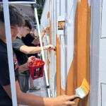 Volunteers at the Hands On and Loaves and Fishes Mural Painting on July 24