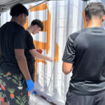 Volunteers at the Hands On and Loaves and Fishes Mural Painting on July 24