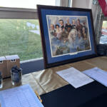 Silent auction items at the Red River Republican Women wine tasting on July 25.