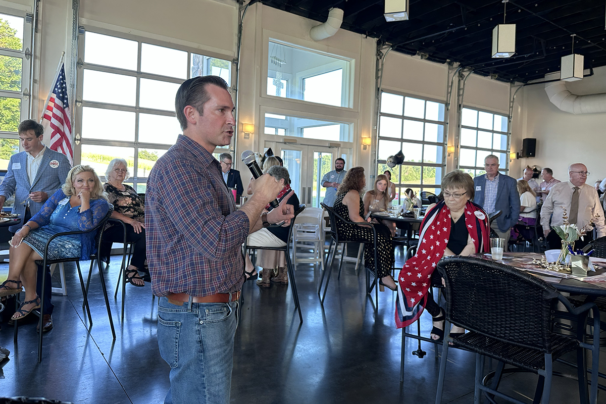 Matt Van Epps speaking at the Red River Republican Women wine tasting on July 25.