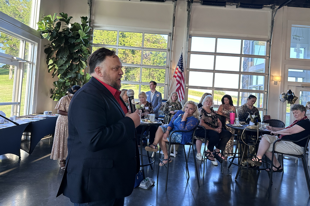 Joe Leurs speaking at the Red River Republican Women wine tasting on July 25.