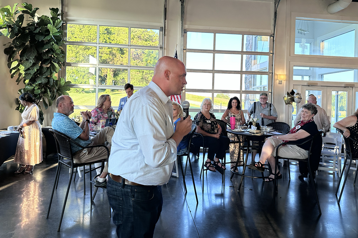 Lee Reeves speaking at the Red River Republican Women wine tasting on July 25.