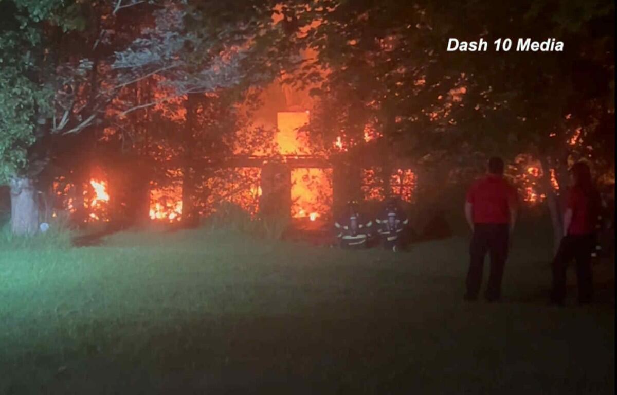 A house was destroyed in a fire on Ogburn Chapel Road in Woodlawn on July 4, 2025. (Dash 10 Media)