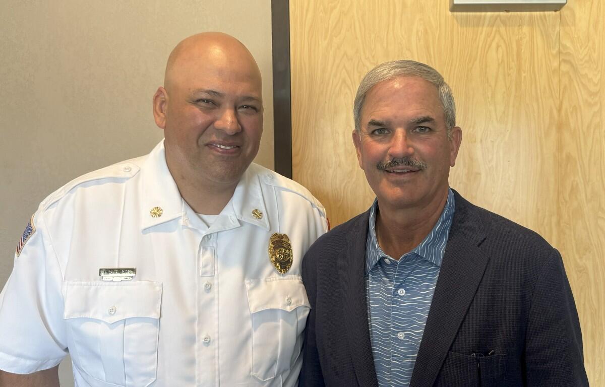 Montgomery County Fire Chief Michael Rios, left, and Charlie Koon.