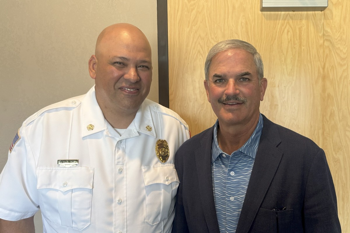 Montgomery County Fire Chief Michael Rios, left, and Charlie Koon.