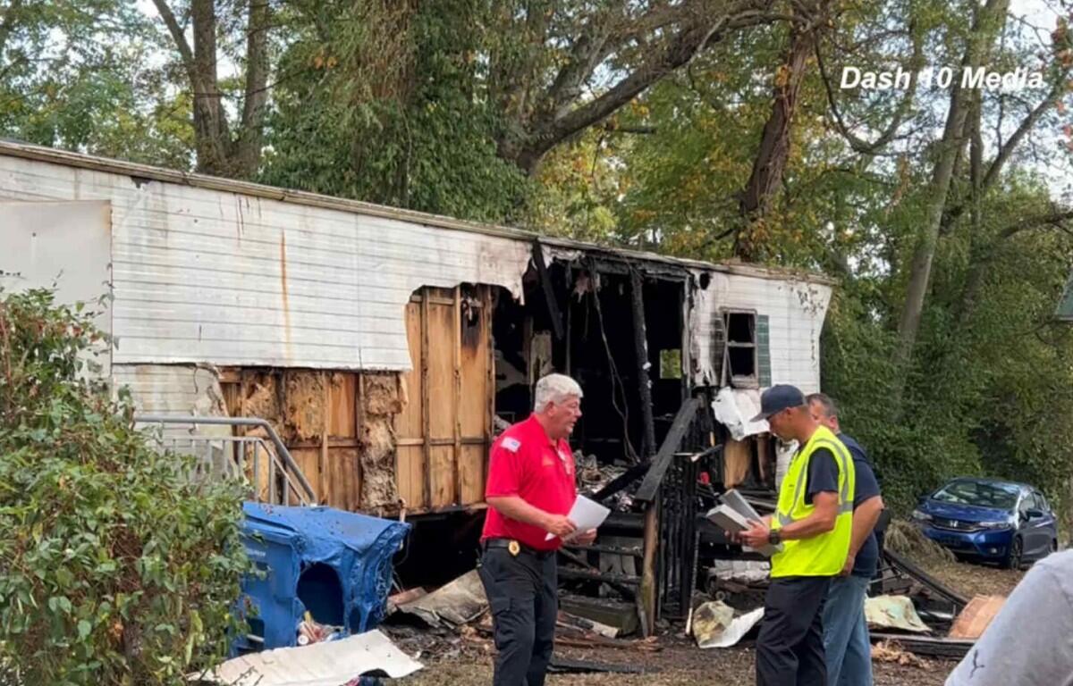 A mobile home caught fire on E Street on Sept. 20, 2025. (Dash 10 Media)