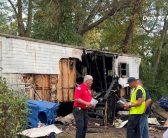 A mobile home caught fire on E Street on Sept. 20, 2025. (Dash 10 Media)