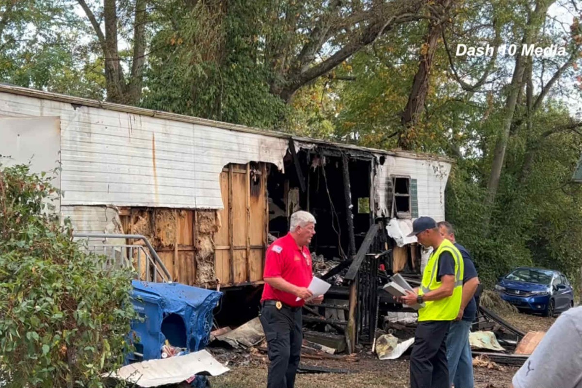 A mobile home caught fire on E Street on Sept. 20, 2025. (Dash 10 Media)