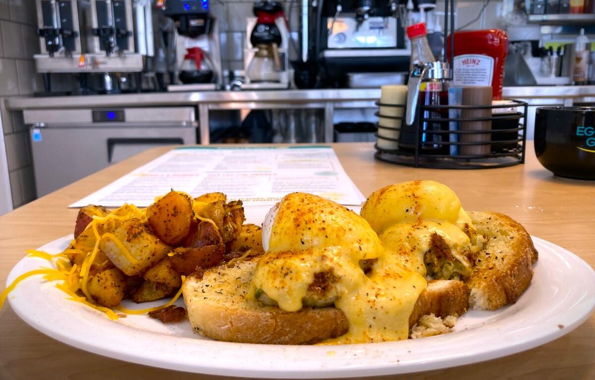 Coastal Crab Cake Benny on the menu of Eggs Up Grill at 970 Tiny Town Road Suite A-B in Clarksville. Sept. 19, 2025. (Christian Brown)
