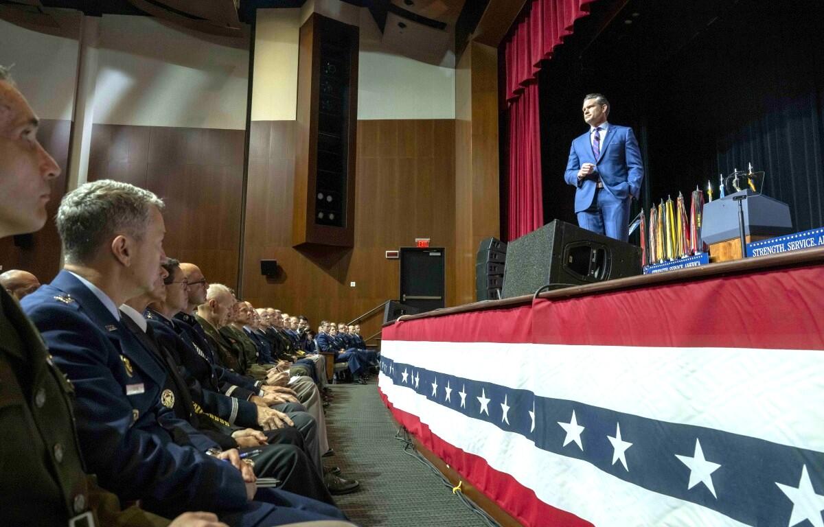 Secretary of War Pete Hegseth delivers remarks during a War Department address at Marine Corps Base Quantico, Va., Sept. 30, 2025.