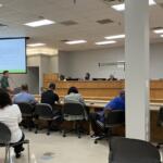 CMCSS Chief Communications Officer Anthony Johnson presents information to the School Board on the expansion of middle school sports on Sept. 9, 2025. (Chris Smith)