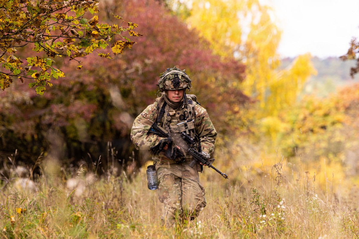 A U.S. soldier assigned to the 101st Airborne Division reacts to simulated contact during Combined Resolve 26-1 at the Hohenfels Training Area, Joint Multinational Training Center, Germany, Oct. 17, 2025. (U.S. Army photo by Sgt. Christian Aquino)