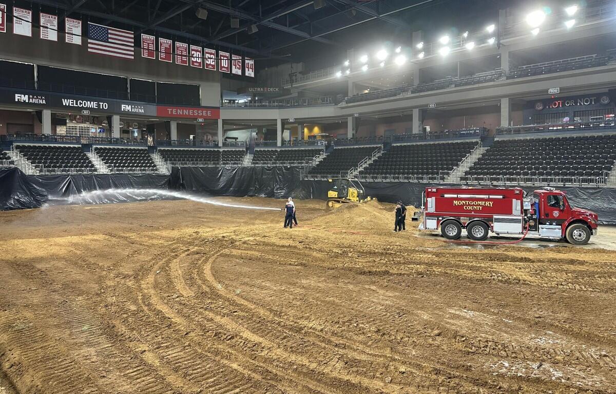 Montgomery County Fire Service sprays down the dirt in the F&M Bank Arena for the upcoming Arenacross events on Oct. 15, 2025. (Maegan Collins/F&M Bank Arena, contributed)