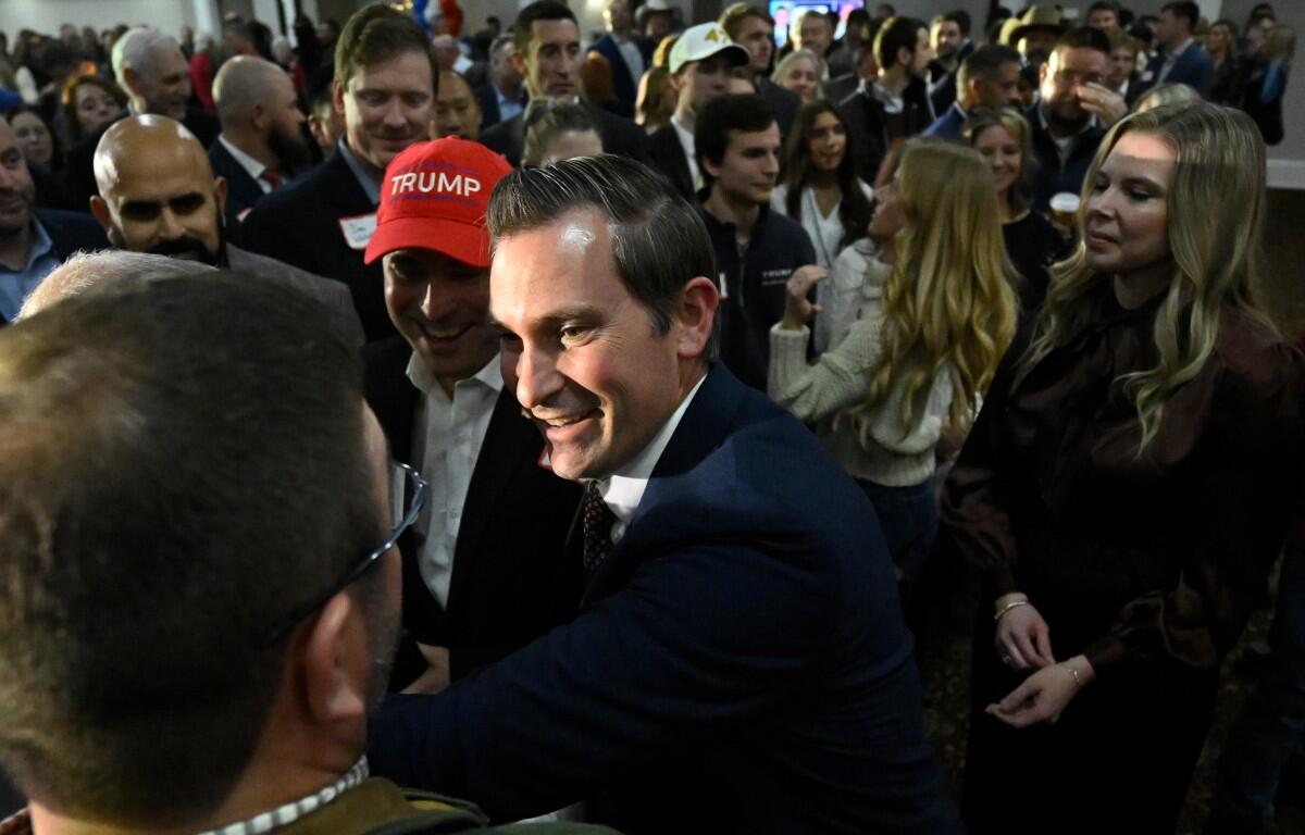 Republican candidate Matt Van Epps interacts with supporters at a watch party after announcing victory in a special election for the U.S. seventh congressional district, Tuesday, Dec. 2, 2025, in Nashville, Tenn. (AP Photo/John Amis)