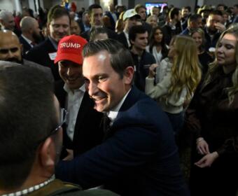 Republican candidate Matt Van Epps interacts with supporters at a watch party after announcing victory in a special election for the U.S. seventh congressional district, Tuesday, Dec. 2, 2025, in Nashville, Tenn. (AP Photo/John Amis)