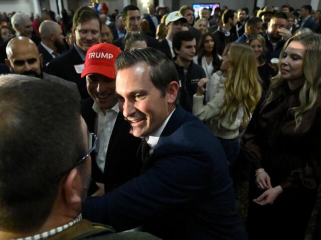 Republican candidate Matt Van Epps interacts with supporters at a watch party after announcing victory in a special election for the U.S. seventh congressional district, Tuesday, Dec. 2, 2025, in Nashville, Tenn. (AP Photo/John Amis)