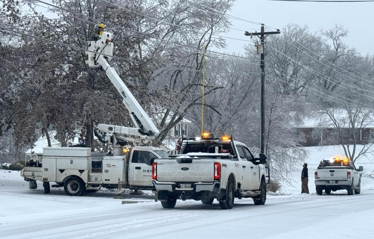 Crews work to restore power on Hillshire Drive near New England Place on Jan. 25, 2026. (Mark Hunter, contributed)
