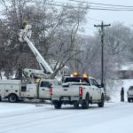 Crews work to restore power on Hillshire Drive near New England Place on Jan. 25, 2026. (Mark Hunter, contributed)