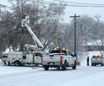 Crews work to restore power on Hillshire Drive near New England Place on Jan. 25, 2026. (Mark Hunter, contributed)