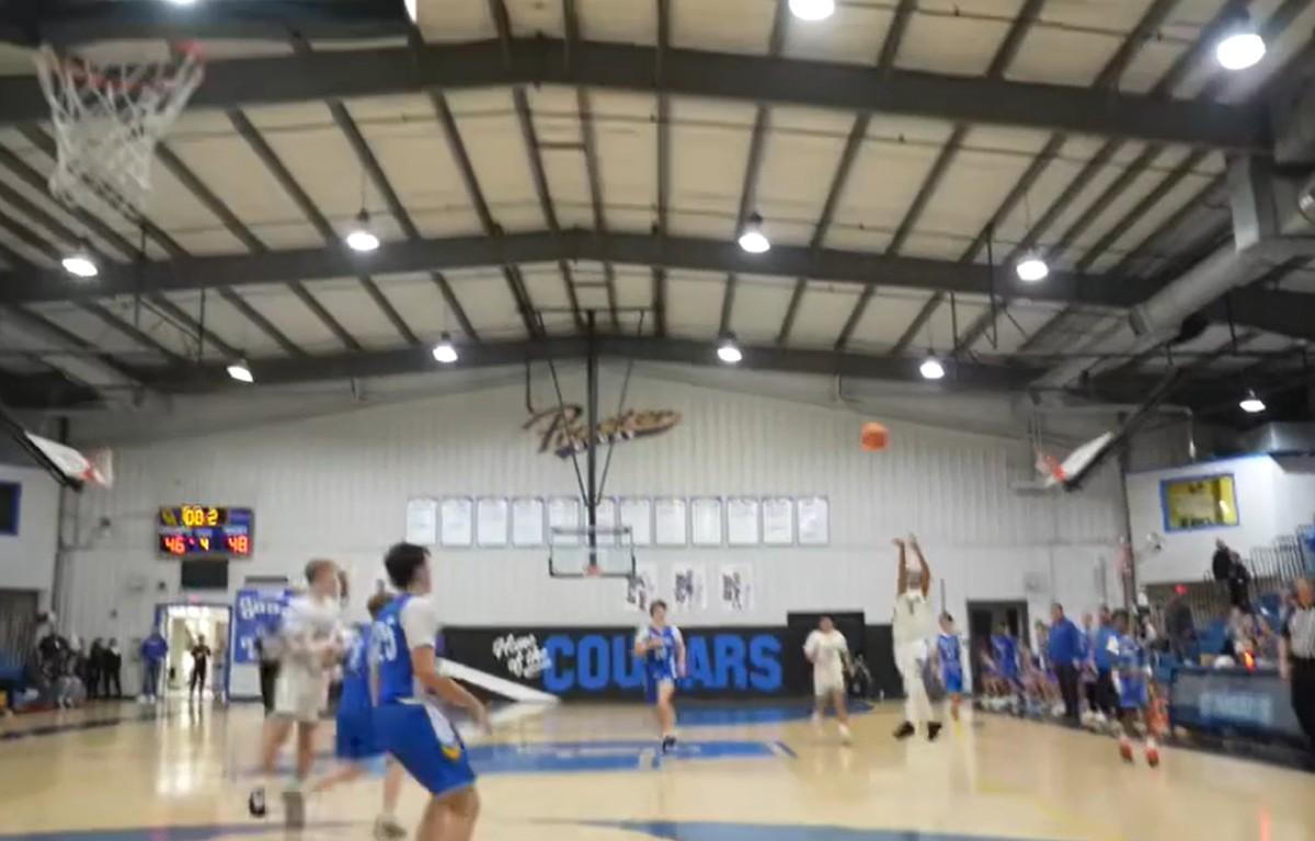Clarksville Academy Middle School's Jeff Rideau shoots from half-court at the buzzer to win the game on Jan. 12, 2026. (Megan Sellers, contributed from video)